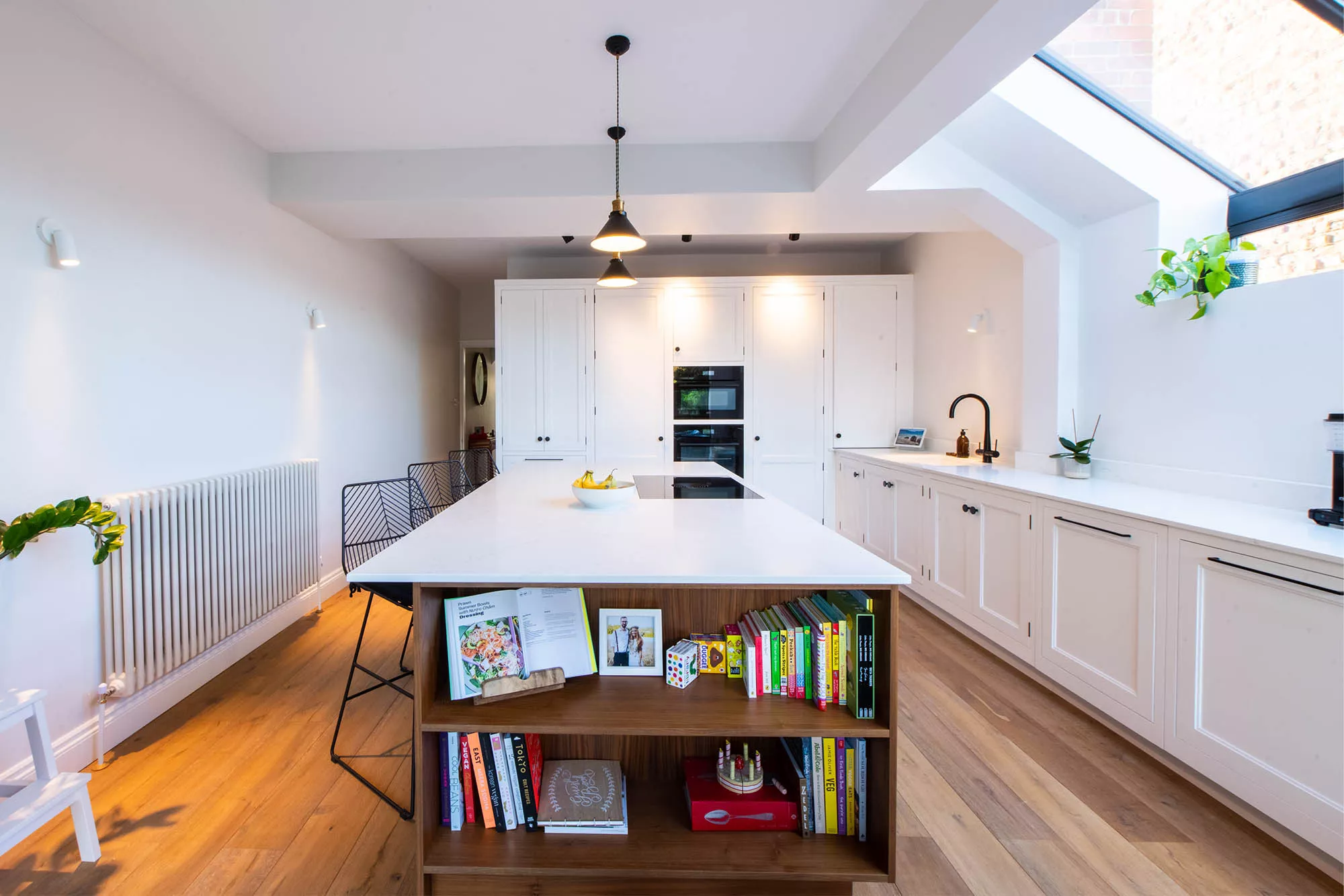 open plan white contemporary kitchen